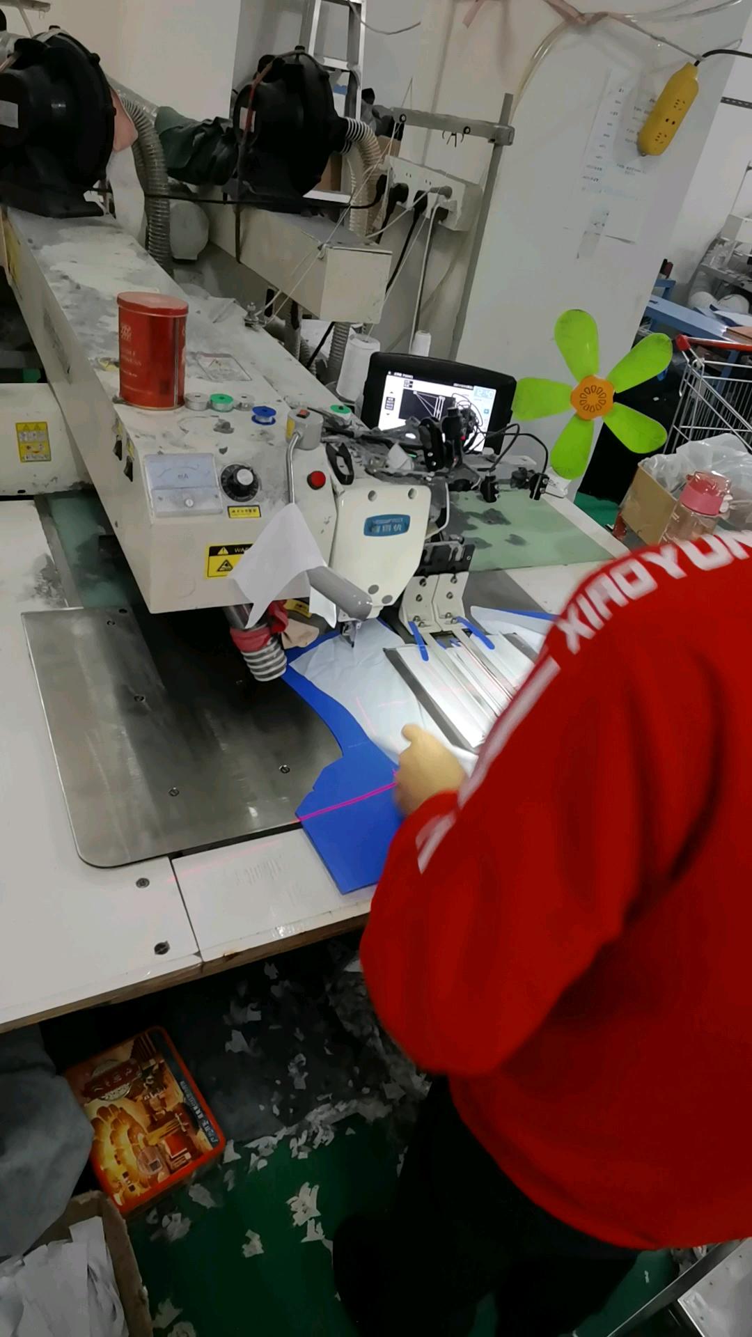 激光自动开袋机工厂开口袋开门襟